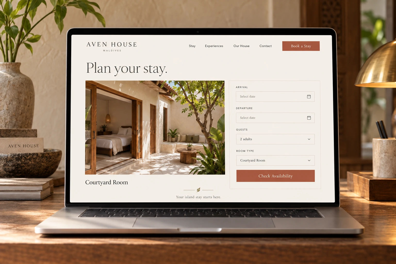 An Aven House booking page on a laptop headed “Plan your stay.” pairs a courtyard room photo with a form for dates, guests and room type.