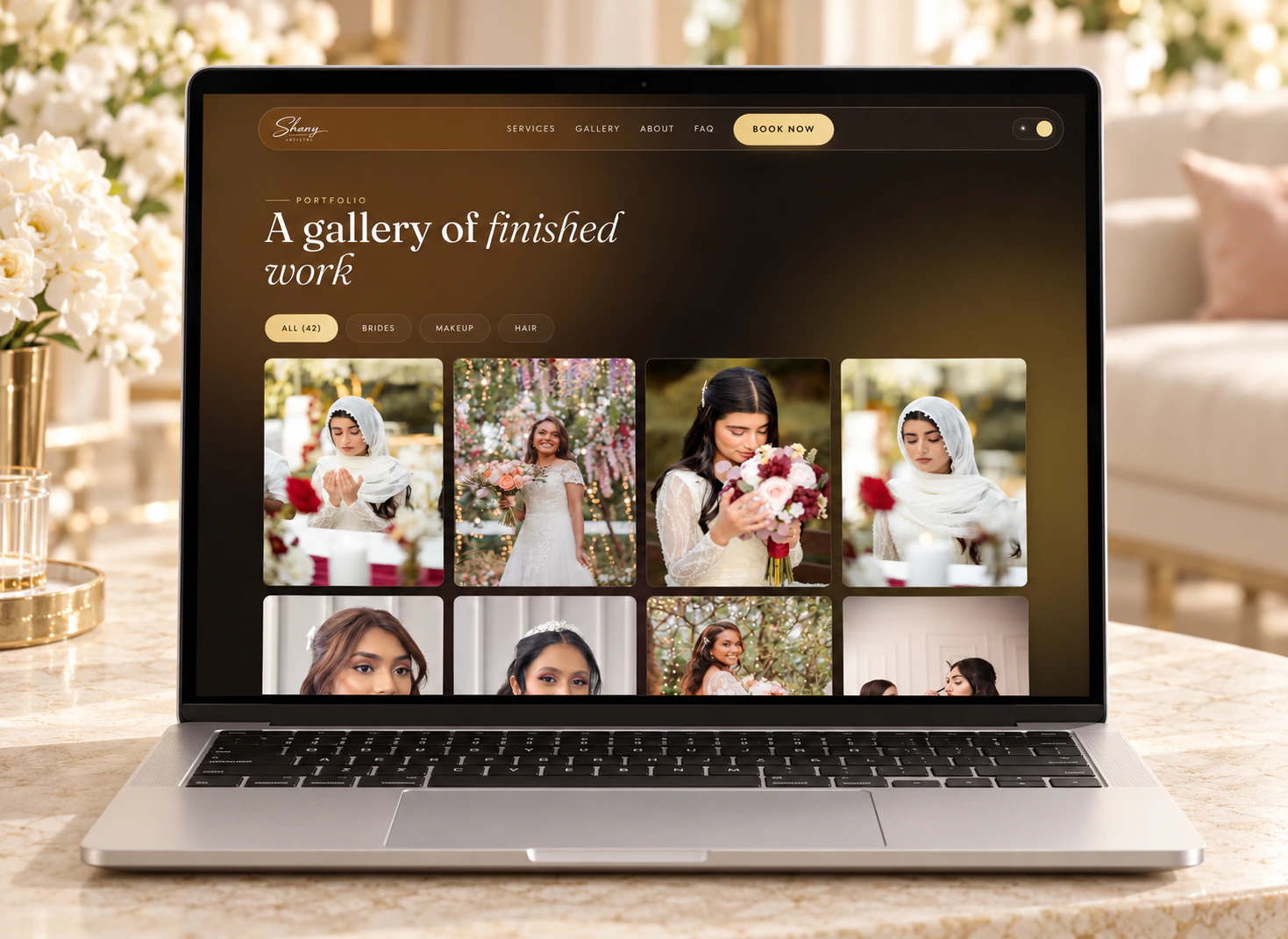 Shany Artistry gallery page, “A gallery of finished work”, with a grid of bridal portraits, on a laptop.